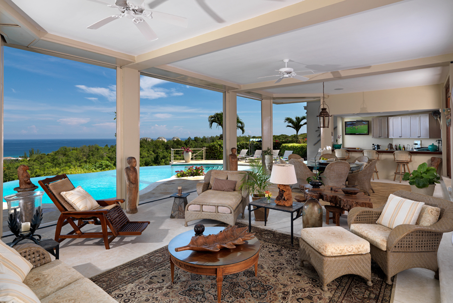 Everyone's favorite gathering place is the long furnished poolside verandah ... with full bar and cable television.