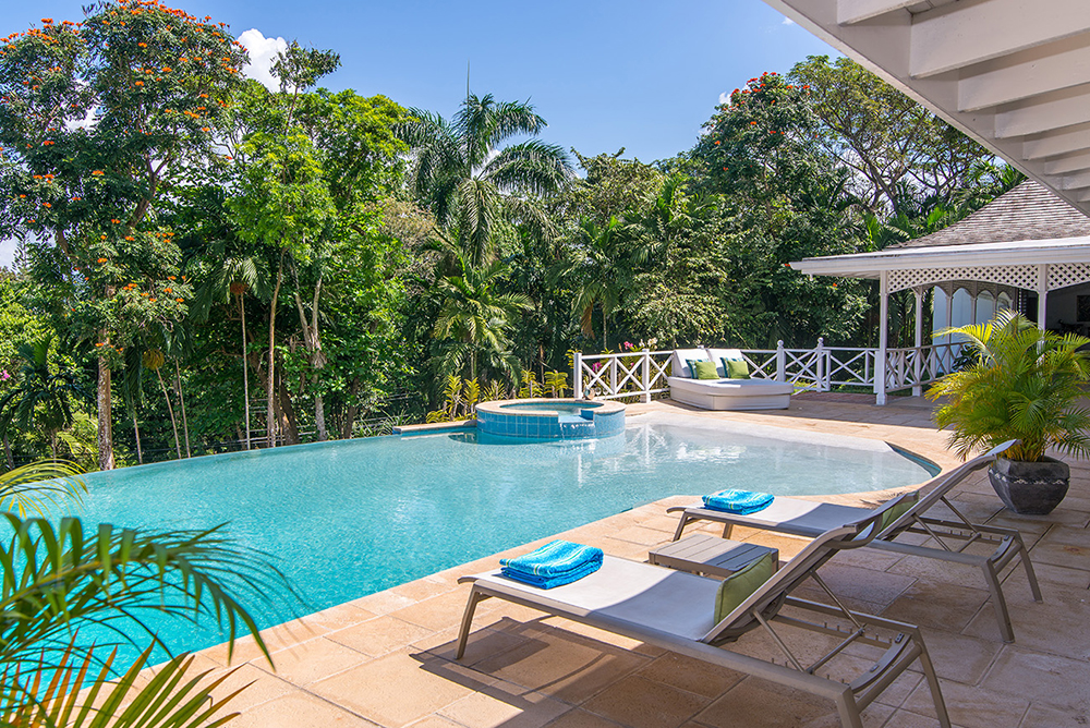 Or choose the private double chaise at the opposite end of the pool. Your villa vacation here will be as active or laid back as you choose.