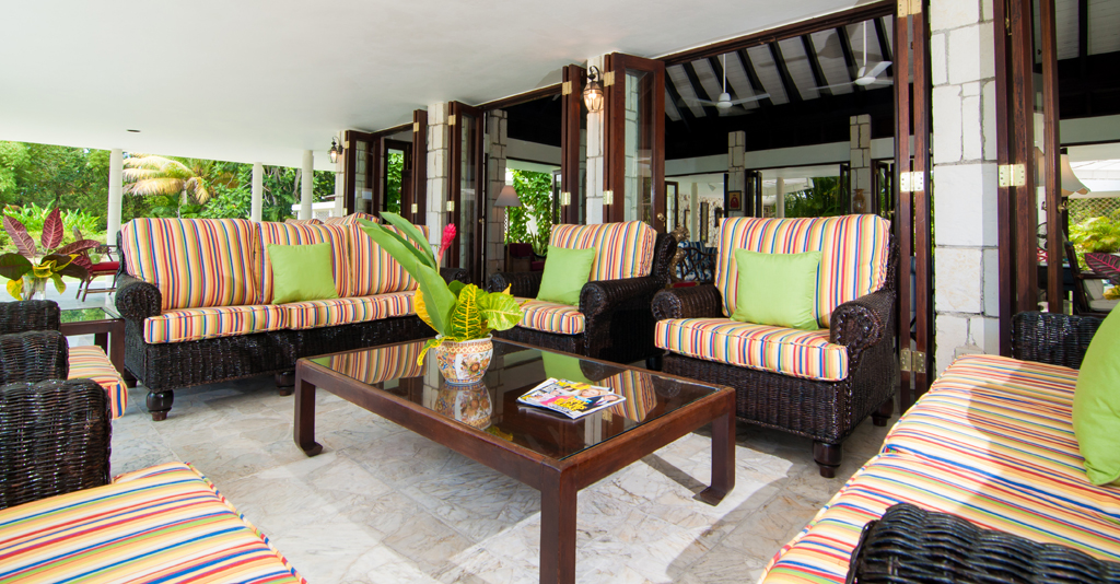 ... generously furnished with deep comfy chairs and sofas, dining tables, nearby bar and cable television.