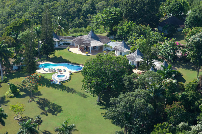 PAVILION is a deluxe five-bedroom private villa on four acres ... with magnificent views of the Caribbean Sea to the north and the lush green mountains to the south. Five minutes from the fro