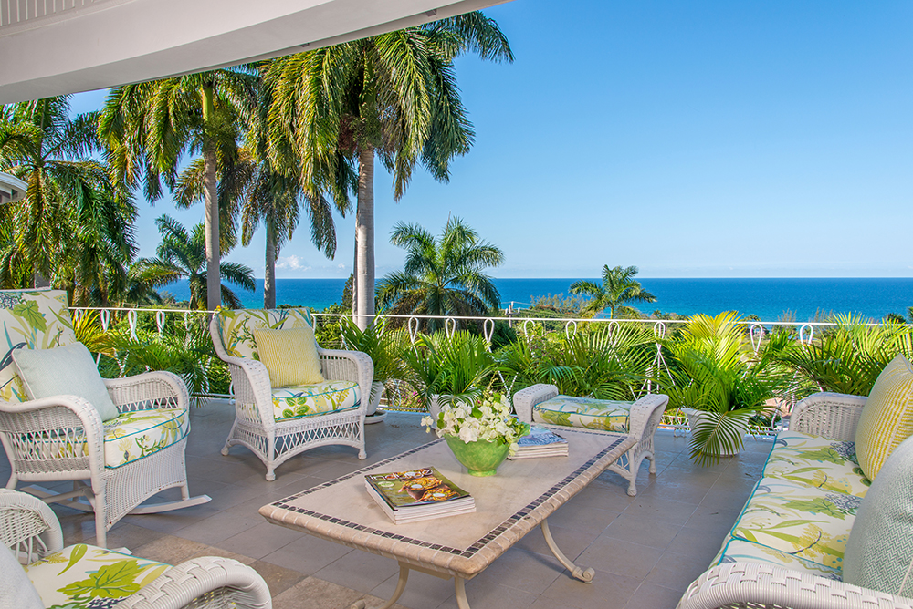 Everyone's favorite gathering place is the comfy verandah with rocking chairs ...