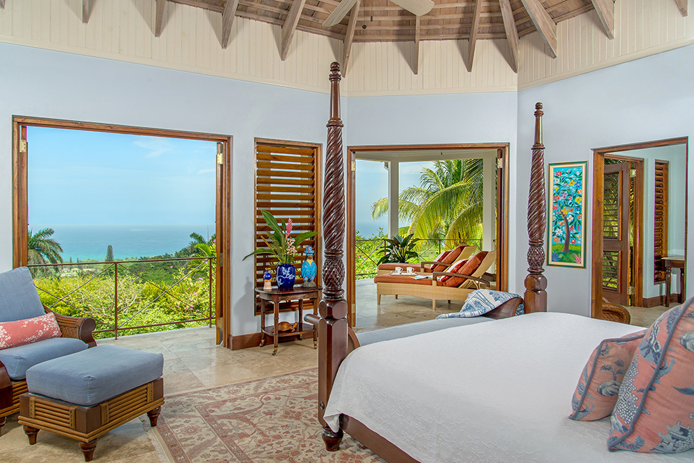 The master suite opens to a private gazebo-style porch with comfy chaises and a mesmerizing blue view of Caribbean Sea ...