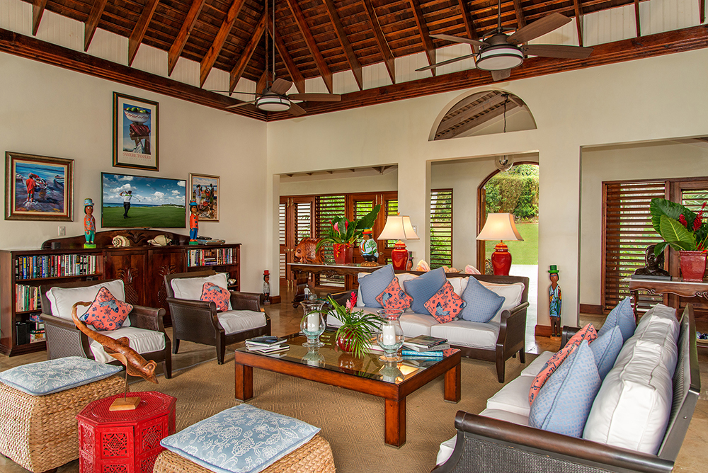 Inside, under a tall rafter-and-beam ceiling, the colorful Living Room is spacious and comfortable ... and includes many entertainment features.