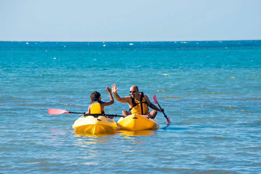 Easily reachable by kayak, at low tide, portions of the reef protrude above the water so you can step from your kayak to snorkel in shallow water.

On the Caribbean side, deeper waters beck